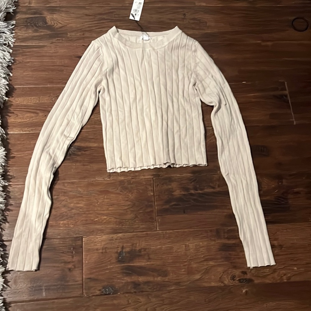 Beige garage sweater